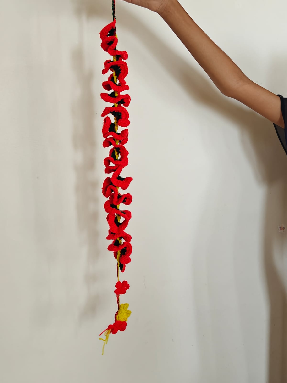 Red crochet windspinner